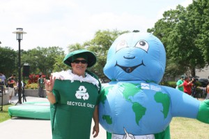 RecycleMan and Super Earth made the rounds at UH’s Earth Day Carnival on Thursday. UH celebrated the green advances the campus has made over the past year.  | Courtesy University Services