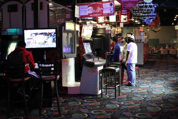 Students play in the UC Games Room before its closing. It will not be open until Phase One of UC construction ends.  |  Rebekah Stearns/The Daily Cougar