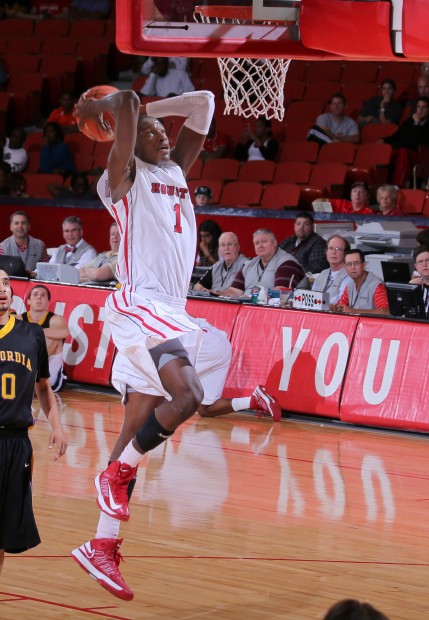 Mikhail McLean rises to slam home a dunk against Concordia. Courtesy of UH Athletics