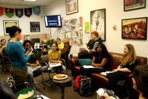 Creative writing senior Joy Lester demonstrated to the group how to properly use a condom.  |  Anthresia McWashington/The Daily Cougar