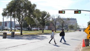 Students cross the street on Calhoun Road. | Rebekah Stearns/The Daily Cougar