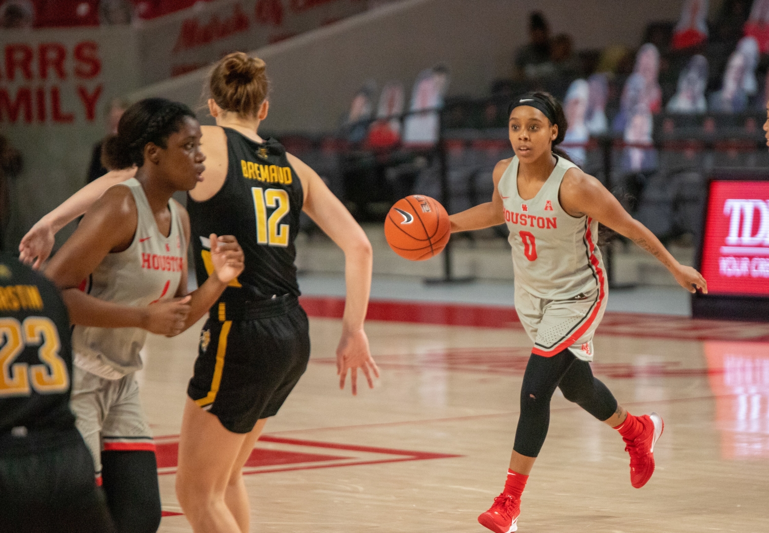 Guard Eryka Sidney dribbles the ball and scans the Wichita State defense in a regular season game on Dec. 30, 2020 at Fertitta Center. She led the UH women's basketball team in scoring against UCF on Sunday with nine points. | Andy Yanez/The Cougar