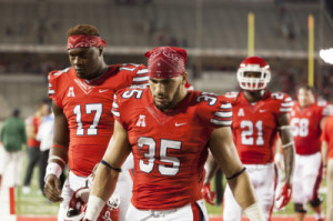 Kenneth Farrow, middle, was signed by the San Diego Chargers as an undrafted free agent. | File photo/ The Cougar