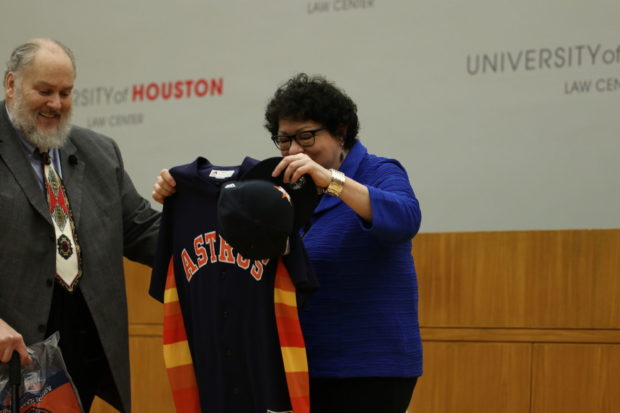 Sonia Sotomayor seen with Michael Olivas at Krost Hall holding Astros gear. 