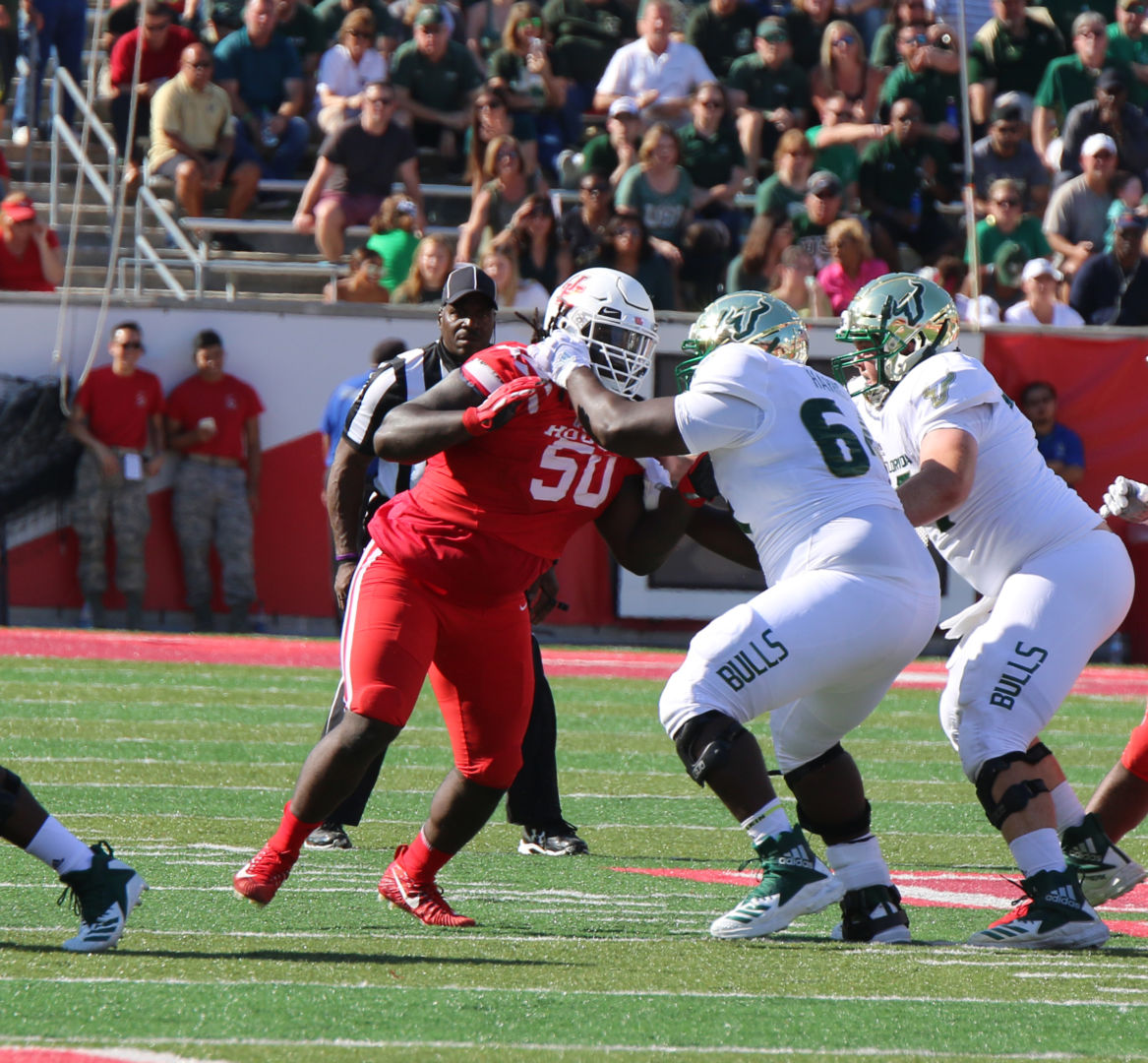 Senior defensive lineman Aymiel Fleming, shown in a 57-36 win over South Florida in 2018, said Houston's season-closer against No. 24 Navy 'my last college hoorah.' | File photo