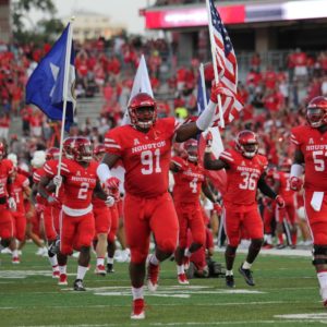 The UH football team running out of the tunnel during pregame introductions at TDECU Stadium during the 2018 season. | File Photo