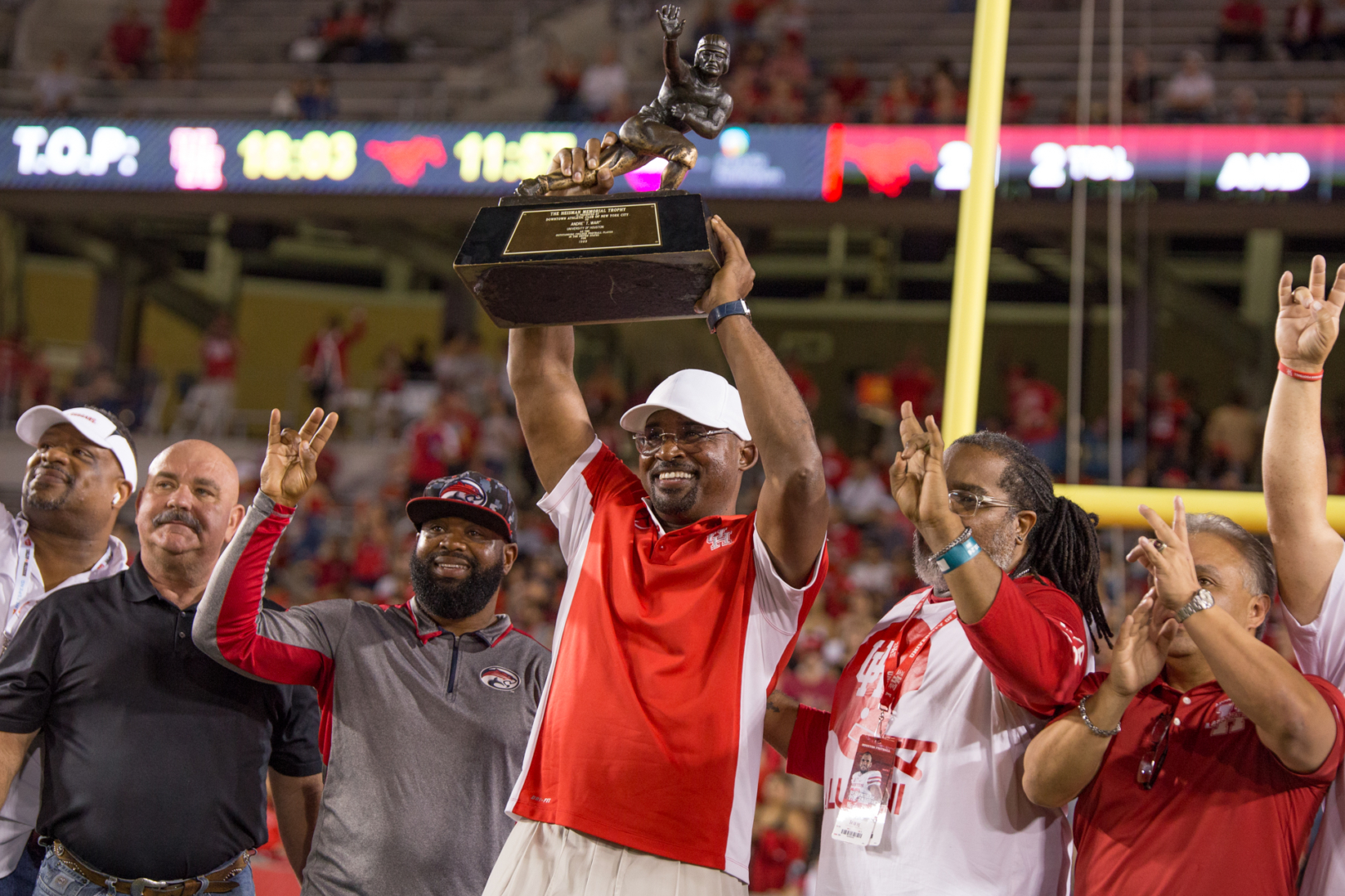 Heisman Trophy winner Andre Ware and the 1989 Cougars were honored in 2019 during halftime against SMU. | Trevor Nolley/The Cougar
