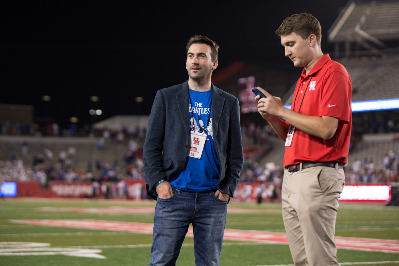 Joey Mellows (left), better known as Baseball Brit by his followers, attended his first college football game at TDECU Stadium after spending the bulk of the year traveling the United States watching professional baseball. | Trevor Nolley/The Cougar
