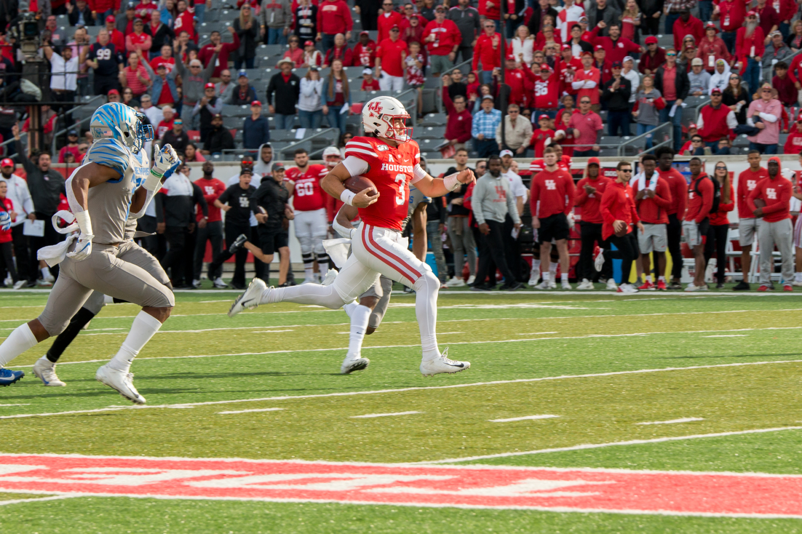 Sophomore quarterback Clayton Tune threw for X yards and rushed for another X in X attempts, including a 68-yard touchdown run in the first quarter of Houston's X-X win/loss to No. 18 Memphis on Saturday at TDECU Stadium. | Katrina Martinez/The Cougar
