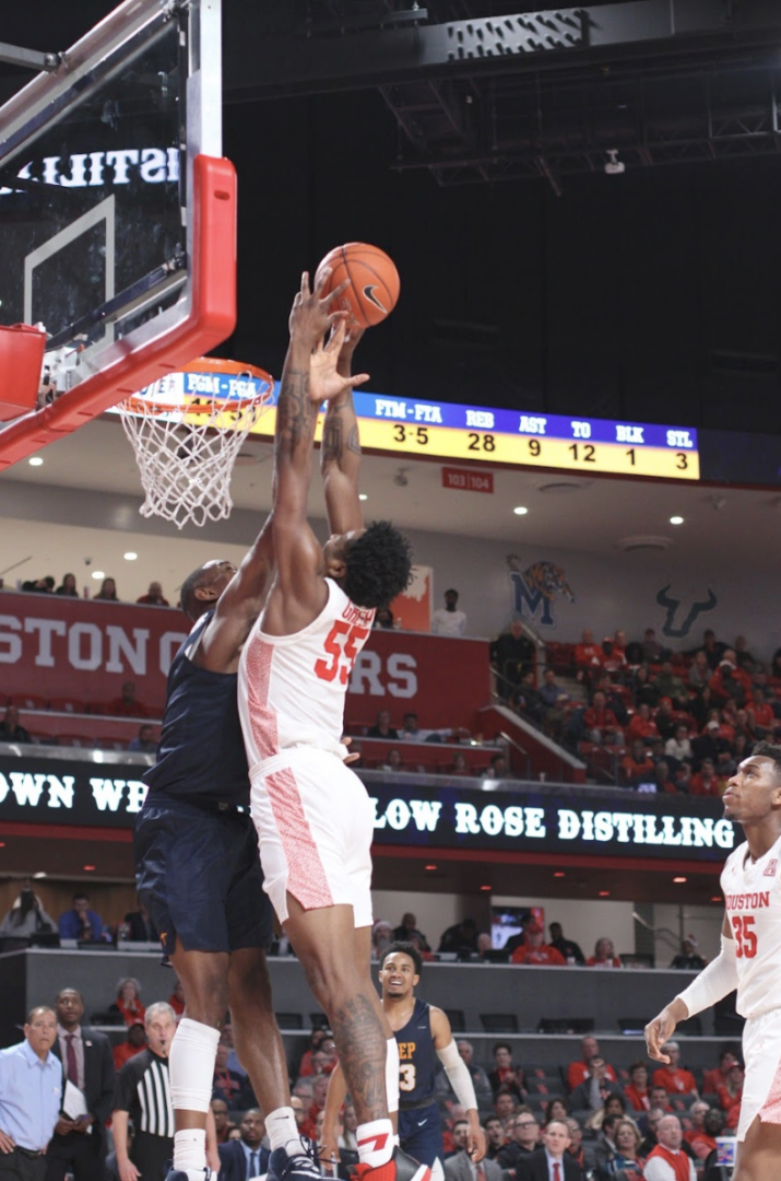 Junior forward Brison Gresham led the way for Houston's defense, blocking six of the Cougars' 11 total blocks in their win over the Miners on Thursday at Fertitta Center. | Catt Lara/The Cougar