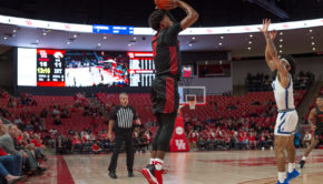 Nate Hinton shooting a 3-point jumper from the corner. He is averaging 9.7 rebounds per game, which is second most in the conference. | File Photo