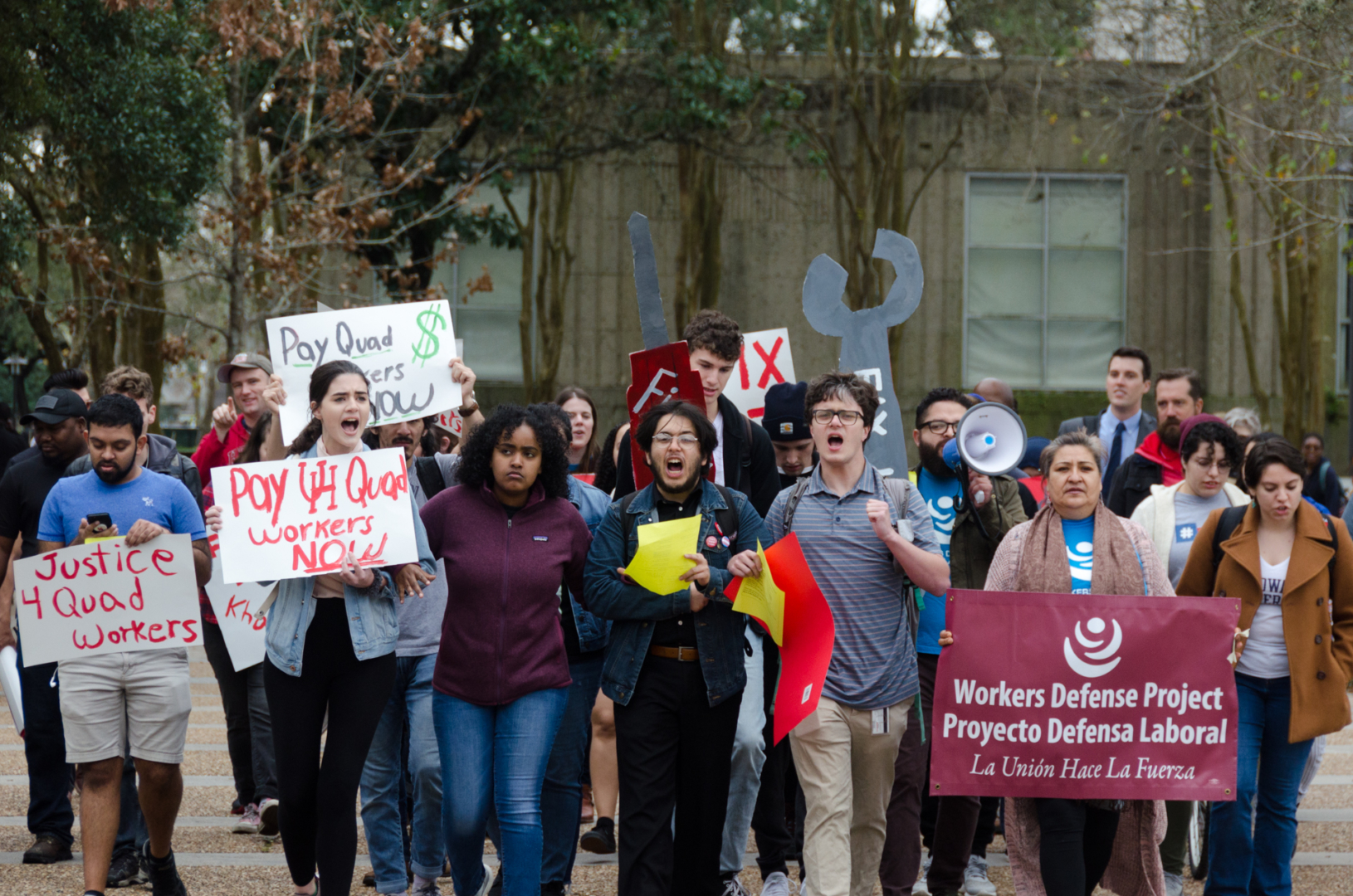 Workers, students and professors gather to protest on campus for unpaid wages that eight construction workers have filed a complaint about. The workers report not being paid at least $43,000 from 2019 while working on the Quad Replacement project. | Lino Sandil/The Cougar