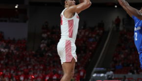 Sophomore guard Quentin Grimes shooting a 3-pointer. The 6-foot-5-inch guard hit two 3-pointers in Houston's win against Memphis. | Mikol Kindle Jr./The Cougar