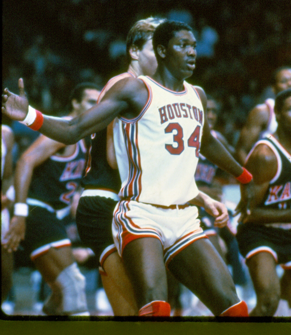 Center Hakeem Olajuwon battling for position in the paint. Another key prospect of the "Phi Slama Jama" teams.