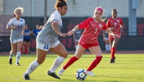 Sophomore midfielder Madison Gear defending an Houston Baptist player in 2019. | Trevor Nolley/ The Cougar