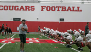 UH head coach Dana Holgorsen looking over his team during training camp practice for the 2019 season. | Kathryn Lenihan/The Cougar