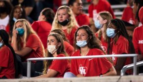 Fans in Houston’s student section enjoy the game with the fashion statement of 2020. They were required to wear face coverings at TDECU Stadium at all times during the game on Thursday afternoon as the UH football team opened its season against Tulane. | Courtesy of UH athletics