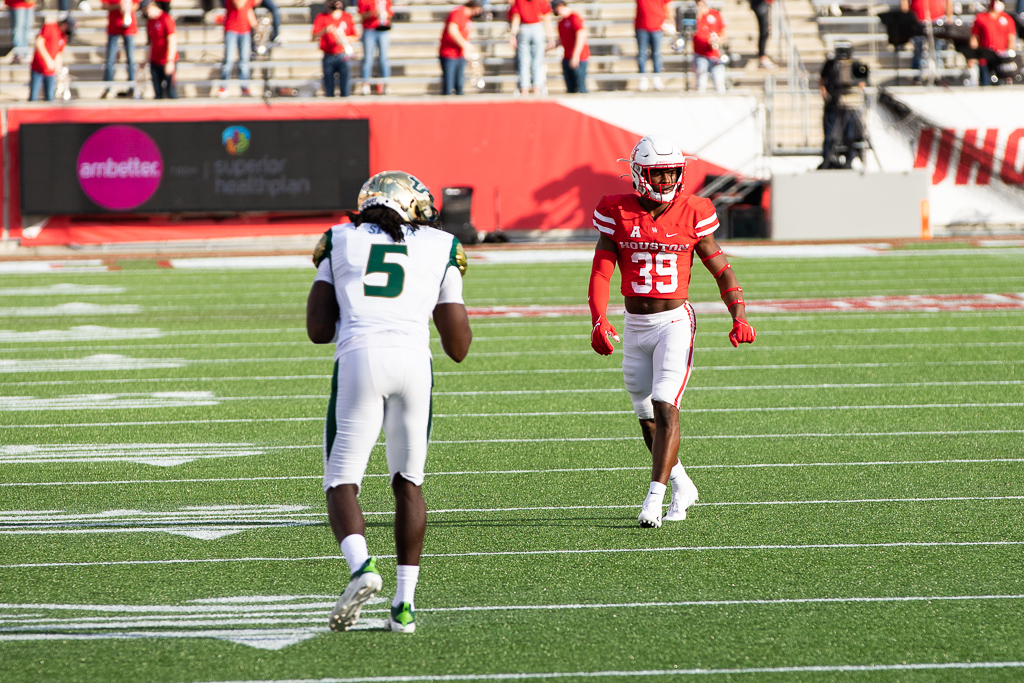 Houston cornerback Shaun Lewis eyes the backfield as USF prepares to snap the ball in Saturday's contest at TDECU Stadium. | Trevor Nolley/The Cougar
