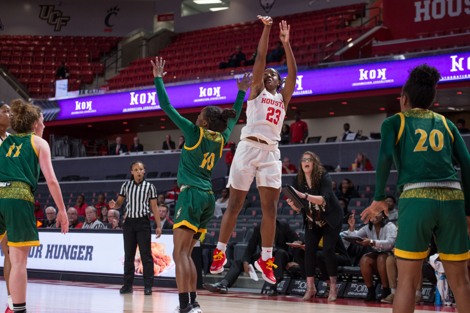 UH women’s basketball guard Julia Blackshell-Fair (23) rises for a contested jump shot at Fertitta Center during the 2019-20 season. | File Photo 