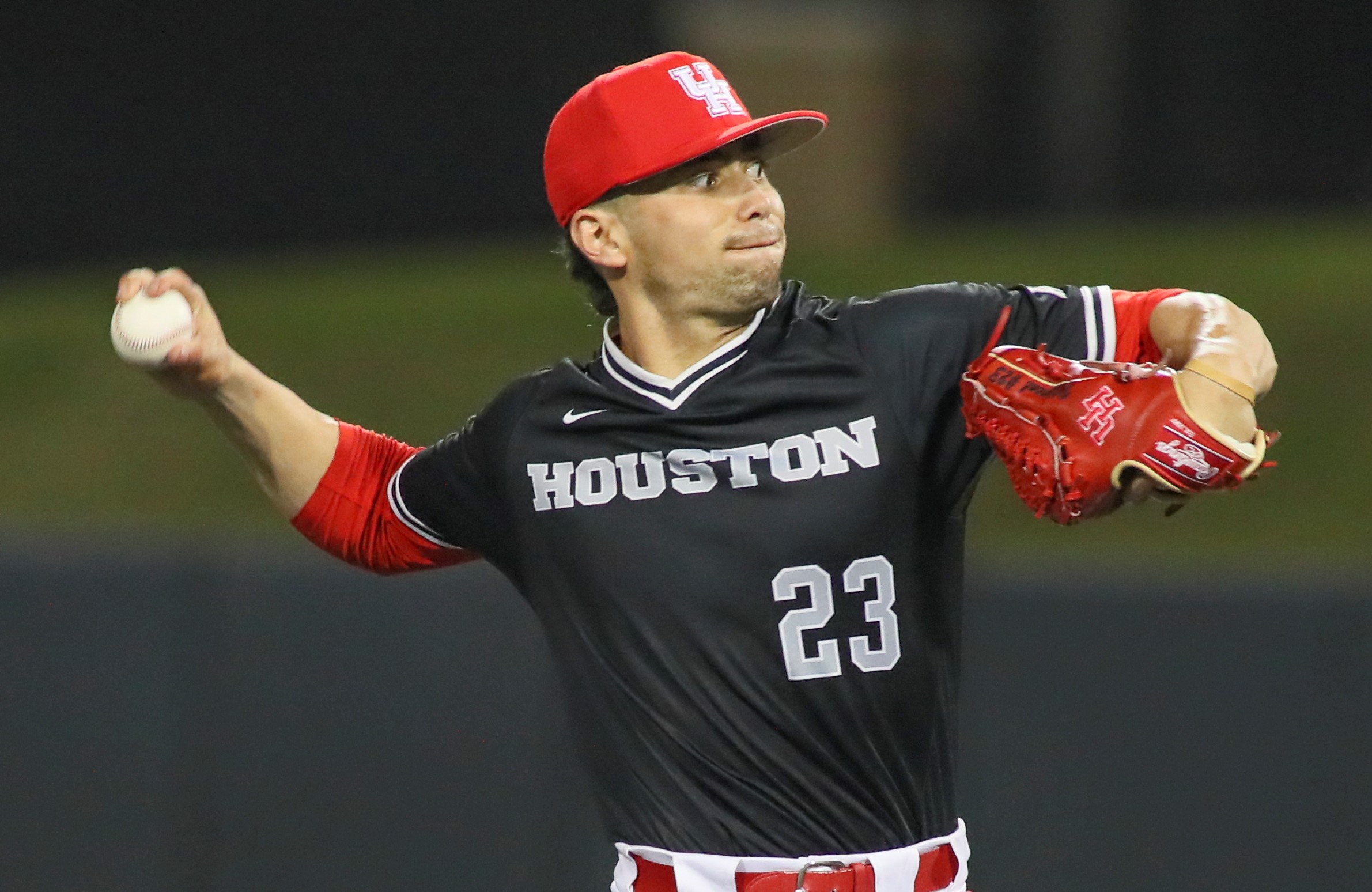 Former UH baseball right handed pitcher Fred Villarreal Jr. extends his arm back as he is in the middle of delivering a pitch. | Courtesy of UH athletics