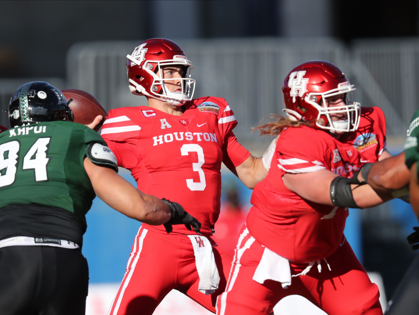Junior UH football quarterback Clayton Tune gets set to throw against Hawai'i in the New Mexico Bowl | Courtesy of UH athletics