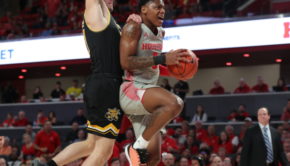 UH guard Marcus Sasser goes for the layup and battles through contact from a Wichita State defender in a game at Fertitta Center during the 2019-20 season. In Saturday's game against UCF, Sasser led UH in points. | Mikol Kindle Jr./The Cougar