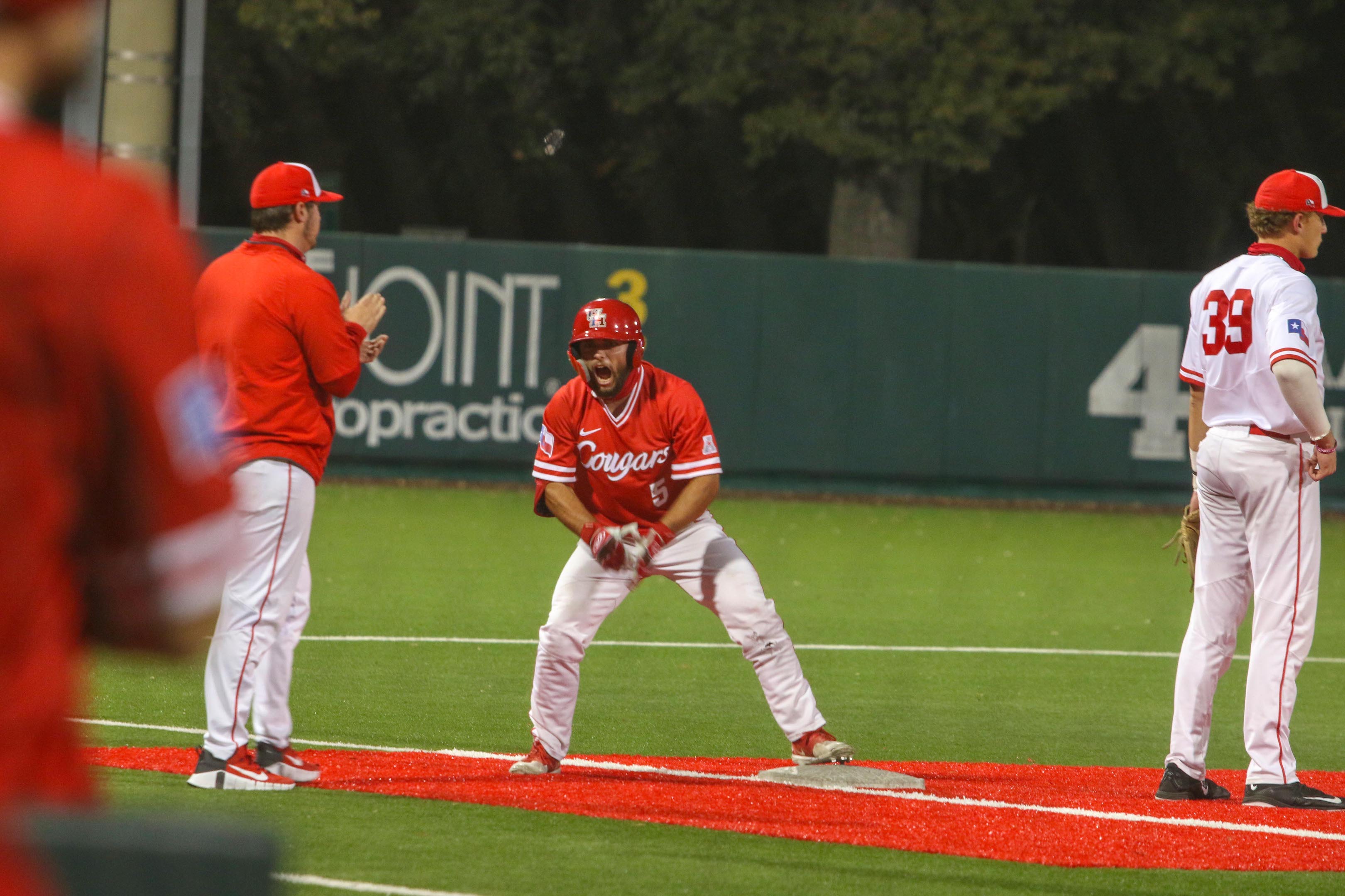 Sophomore infielder Brad Burckel celebrates a triple during the Cougars annual Red-White series in November. The 2021 UH baseball schedule was released on Wednesday. | Courtesy of UH athletics