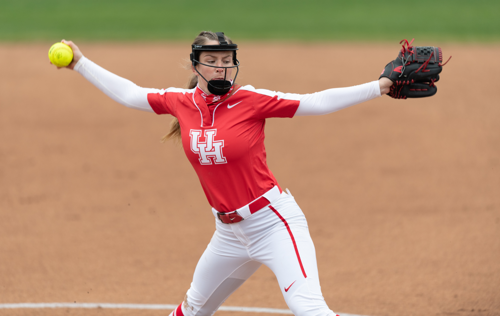 Junior pitcher Rachel Hertenberger winds up in the circle during UH softball's 2021 season opener against Lamar. | Courtesy of UH athletics