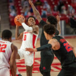 Houston sophomore guard Marcus Sasser (0) rises up for a contested shot against SMU in a regular season game on Jan. 31 at Fertitta Center. | Andy Yanez/The Cougar