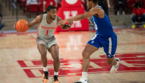 UH freshman guard Jamal Shead dribbles past an Our Lady of the Lake defender on Saturday at Fertitta Center. Shead finished a rebound short of a triple-double. | Andy Yanez/The Cougar
