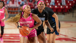 UH junior forward Tatyana Hill (30) drives to the basket against Memphis on Feb. 13 at the Fertitta Center. Hill led the team with 15 points and nine rebounds. | Andy Yanez/The Cougar