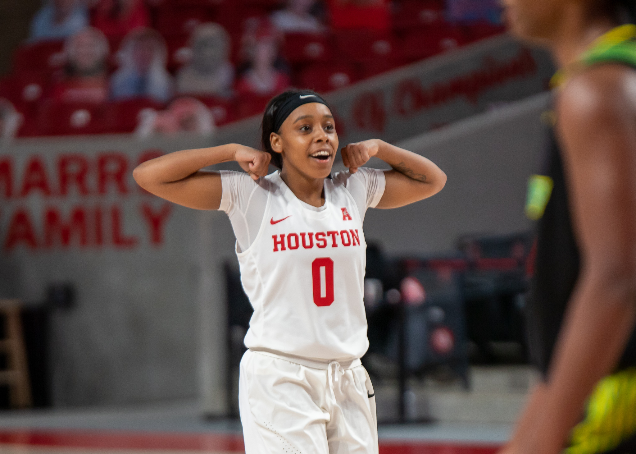 Fifth-year UH women's basketball senior guard Eryka Sidney flexes in UH women's basketball's dominating 67-49 win over No. 13 USF. | Andy Yanez/The Cougar