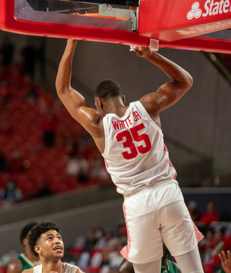UH senior forward Fabian White throws down a dunk during the team's dominant win over South Florida. | Andy Yanez/The Cougar