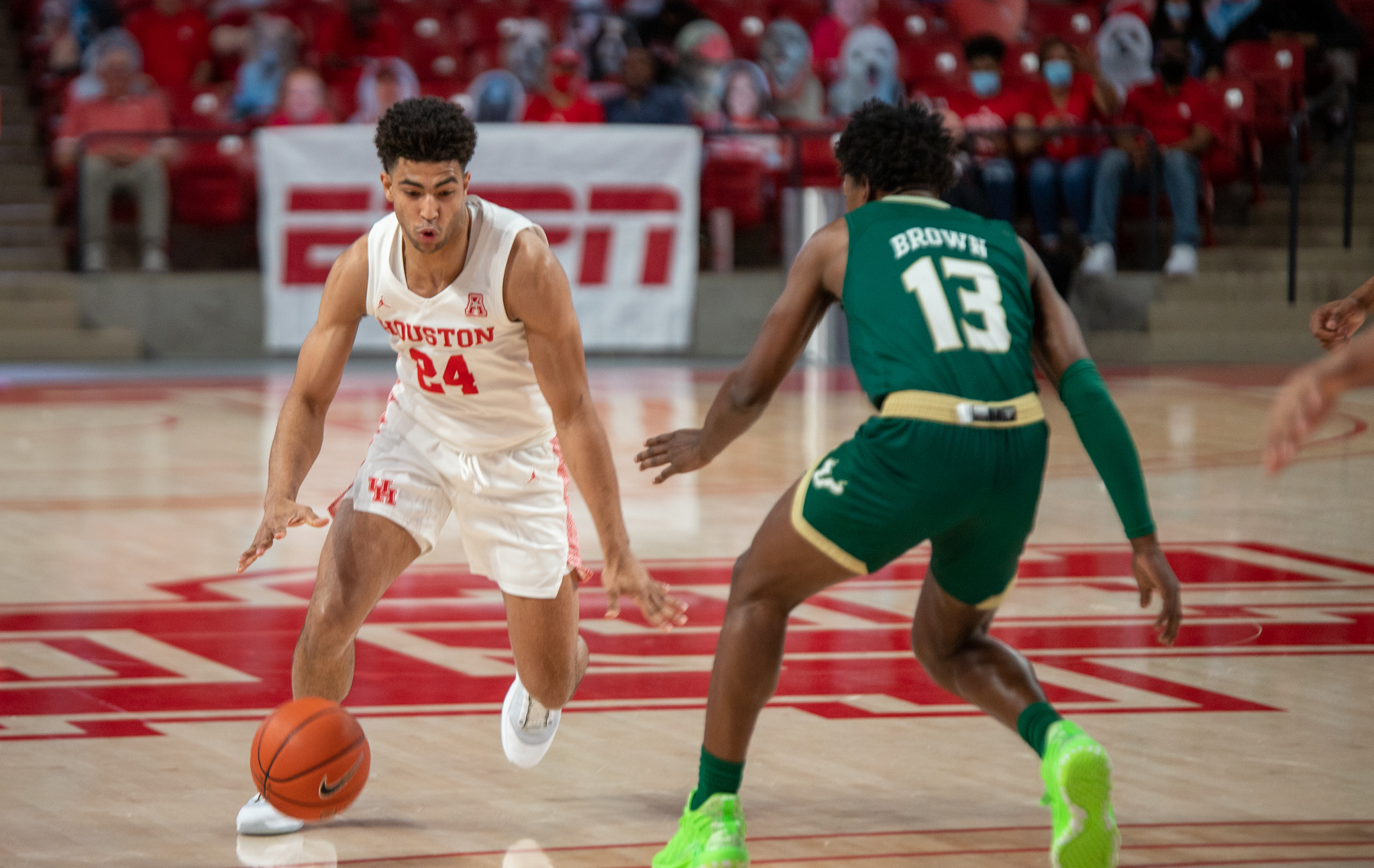 Houston men's basketball guard Quentin Grimes attacks USF guard Justin Brown on Feb. 28 at Fertitta Center. UH will host Memphis this Sunday. | Andy Yanez/The Cougar