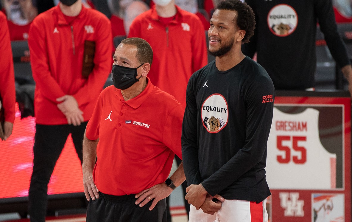 UH basketball head coach Kelvin Sampson (left) and senior forward Justin Gorham look at the scoreboard of the Fertitta Center during senior day for the Cougars on March 7 at Fertitta Center. | Andy Yanez/The Cougar