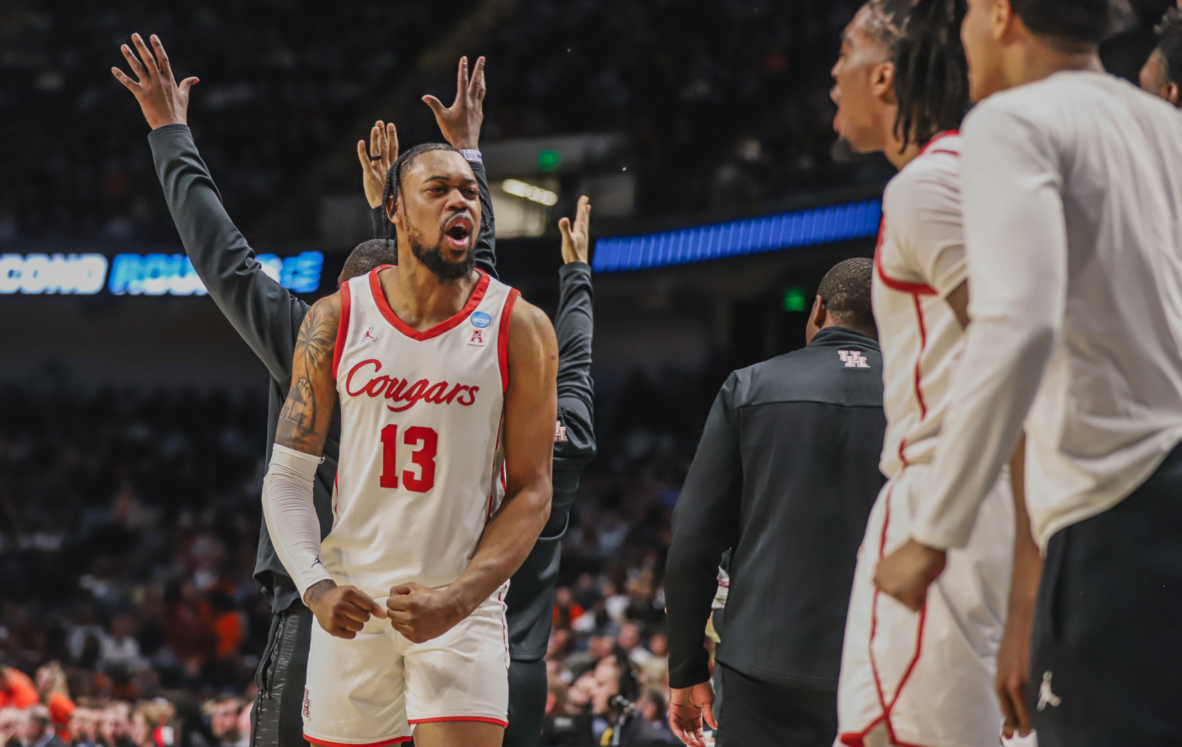 KANSAS CITY, MO. — Find a way. That has been Houston’s mantra all season. It will continue to be the message when the Cougars, making their fourth straight Sweet 16 appearance, take the court at T-Mobile Center on Friday night. “‘Find a way’ is exactly what it means, exactly what it sounds like,” said UH point guard Jamal Shead. “Find a way to win whether it’s scrapping and fighting to get a loose ball, rebound, anything, it’s just whatever it takes to win.” Miami (27-7) is the next obstacle on UH’s road to NRG Stadium. About Miami The Hurricanes are back in the Sweet 16 for the second straight season after Drake in their NCAA Tournament opener and Indiana in the round of 32. Miami, the regular season co-champions of the ACC with Virginia, has one of the most potent offense’s in college basketball, averaging 79.1 points per game. Miami head coach Jim Larrañaga plays a small lineup, starting four guards, which allows the Hurricanes to spread the floor. “(Larrañaga) puts his best players in position to be successful and he lets them play,” said UH head coach Kelvin Sampson. “You can tell they have great freedom.” Isaiah Wong, the AAC’s Player of the Year, leads Miami in scoring with 16.1 points per game. Against Indiana in the round of 32, Wong scored 27 points and grabbed eight rebounds. Jordan Miller and Kansas State transfer Nijel Pack both average double figures scoring and shoot better than 35 percent from 3. Wooga Poplar, a 6-foot-5-inch guard, is questionable for Friday’s game after suffering a back injury in Miami’s win over Indiana. Larrañaga said Poplar practiced on Thursday and looked good. “I’ll talk to my trainer, and he’ll give me an indication of whether Wooga’s ready to go,” Larrañaga said. “If he’s ready to go, he’ll be in the starting lineup as always.” Poplar, who averages 8.4 points, is lethal from 3, hitting 40.2 percent of his shots beyond the arc this season. Rounding out the Hurricanes’ starting five is Norchard Omier, a 6-foot-7-inch forward who averages a double-double scoring 13.4 points and pulling down 10.1 rebounds per game. Omier has 31 rebounds in Miami’s first two NCAA Tournament game. “Their most valuable player is probably Omier,” Sampson said. “He’s probably the best rebounder that we’ve played against.” UH forward J’Wan Roberts, who leads the Cougars in rebounding, echoed his head coach on what he’s seen from Omier on film. “He’s a relentless rebounder,” Roberts said. “Somehow the ball always finds him.” As a team, the Hurricanes are top-40 in the country in 2-point field goal percentage (54.1 percent), 3-point field goal percentage (36.8 percent) and free throw percentage (77.4 percent). “They’re probably the best offensive team that we’ve played this year at all five positions,” Sampson said. UH injury updates Marcus Sasser, who has been dealing with a groin injury he suffered on March 11, said he felt about 80 to 85 percent prior to UH’s practice on Thursday afternoon. With the way his recovery has been progressing, UH’s All-American guard said he expects to be at 90 percent for Friday’s game against Miami. “In practice, I can move a little bit more without it hurting. I can do a lot more things that I couldn’t do last week,” Sasser said. “The progression is there for sure. It’s getting better day by day” Shead, who has been dealing with patellar tendonitis in his right knee, said he feels fully healthy after having nearly a week to recover since UH beat Auburn to advance to the Sweet 16. “I’m back to 100 percent,” Shead said. Strength on strength Miami can light up the scoreboard, averaging 74 points per game in the NCAA Tournament. “Every one on (Miami) can score the ball in a variety of ways,” Shead said when asked about the challenges the Hurricanes present. “They can really shoot the ball.” UH almost always holds its opponent under its scoring average, ranking second in the country in scoring defense. In the second half of its win over Auburn in the round of 32, UH held Auburn to just 16.7 from the field. “We’re 33-3 not because we’re an offensive juggernaut. We’re 33-3 because we can defend and rebound,” Sampson said. One of those things will have to give on Friday night. A high-scoring, shootout favors the Hurricane. A grind it out, physical battle gives the advantage to the Cougars. “They’re a great offensive team, we’re a great defensive team,” Sasser said. “I just feel like whoever plays to their strengths the best is probably going to win.” How to watch Tipoff is scheduled for 6:15 p.m. on Friday. The game will air on CBS with Jim Nantz, Bill Raftery, Grant Hill and Tracy Wolfson on the call. The game can also be heard via radio on KPRC 950 AM.