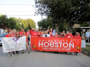 The LGBT Resource Center gathers their members behind a banner as they line up in preparation for the Houston Pride Parade, which was held Saturday on Westheimer.  | Courtesy of the LGBT Resource Center