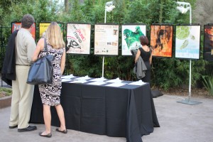 Several attendees check out the posters at the Houson Zoo during the silent auction portion of the event.  |  Rebekah Stearns/The Daily Cougar