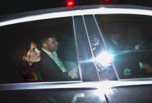 Amanda Knox, left, sits next to Corrado Maria Daclon, the secretary-general of the Italy-USA Foundation as they leave the prison in Perugia, Italy Oct. 3, 2011. Knox was rushed  to the airport that night and flown home to the U.S. and now she faces  the possibility of having to go back. / Wikimedia Commons