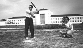 Corbin J. Robertson takes his turn at bat in front of the Ezekiel Cullen building. Photo courtesy of Special Collections, University Archives, University of Houston Libraries.