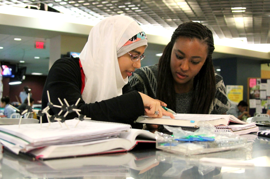 Chemical engineering sophomores Ysabel Abraham (left) and Nora Elghetory represent the great diversity of the UH community. This scene is not uncommon on campus. | Justin TijerinaThe Daily Cougar