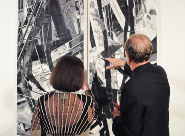 Attendees admire some of the artwork on display at Blaffers' Ready. Steady. Go! Gala. By Conny Ramirez