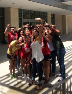 Alba Galindo takes a selfie with participating students.