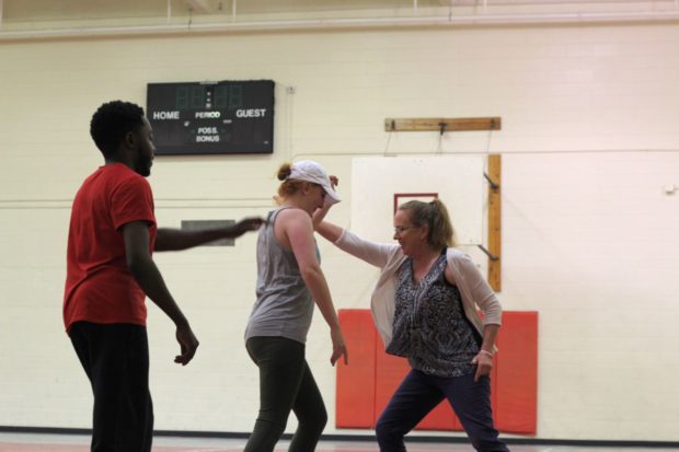 Health communications graduate student Sydney Sydnee Spruiell blocking a punch by instructor Jessica Wheeler. Students attend the self-defense class to help feel safer on campus when alone.  