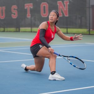 UH tennis senior Phonexay Chitdara, who played key stretches for the Cougars over the weekend, stretches for the ball in a match in 2019. | File photo
