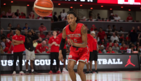 Caleb Mills, who led the Cougars with 23 points against Temple, passing the ball. The Cougars dominated the Owls on the glass 54-32 in the win | File Photo