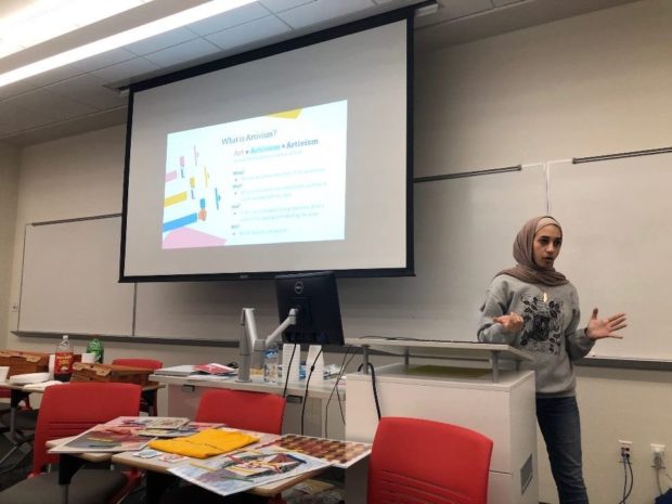 On Monday, YEA hosted their “Artivism” event, where students could express and empower themselves through crafts. Art and computer science senior Lisa Habazi (pictured) told explained the meaning of "Artivism" to the event's attendees. | Courtesy of UH YEA