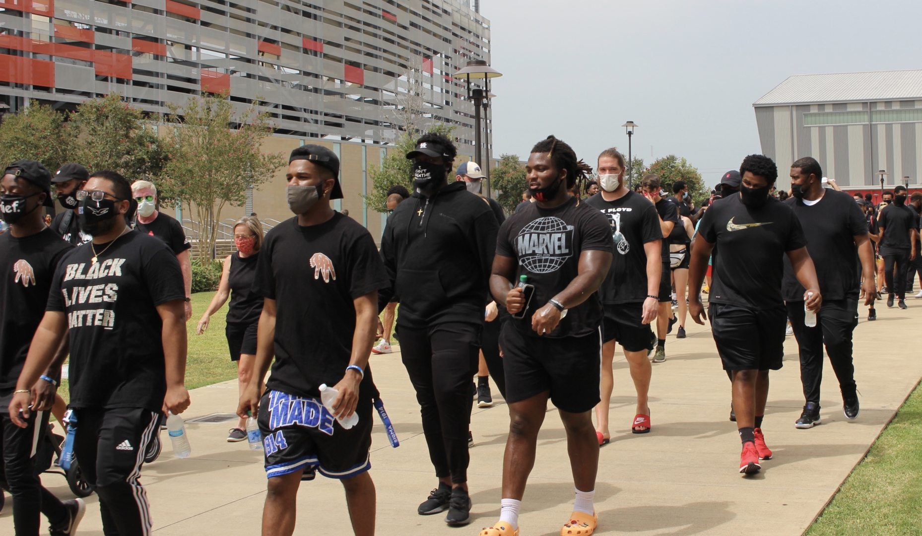 Student-athletes from all UH athletic programs came together on Saturday to march for racial and social equality. | Donna Keeya/The Cougar