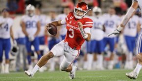 UH junior quarterback Clayton Tune begins his slide after a rush against BYU during last Friday's game at TDECU Stadium. Houston lost 43-26 after BYU took complete control of the contest in the final period. | Courtesy of UH athletics