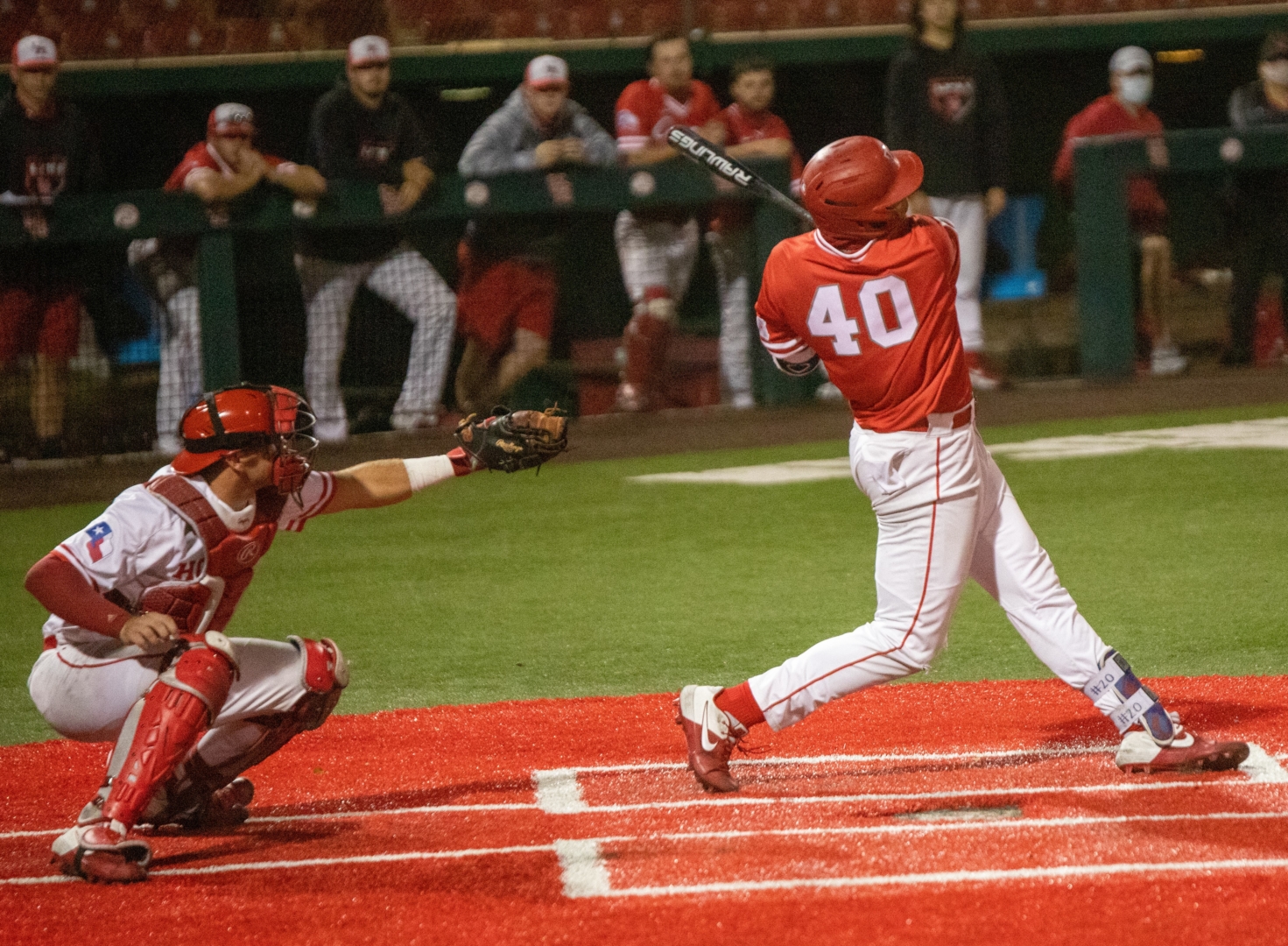Houston first baseman Ryan Hernandez takes a swing at a pitch during the first game of the red-white series at Schroeder Park on Friday evening. | Andy Yanez/The Cougar